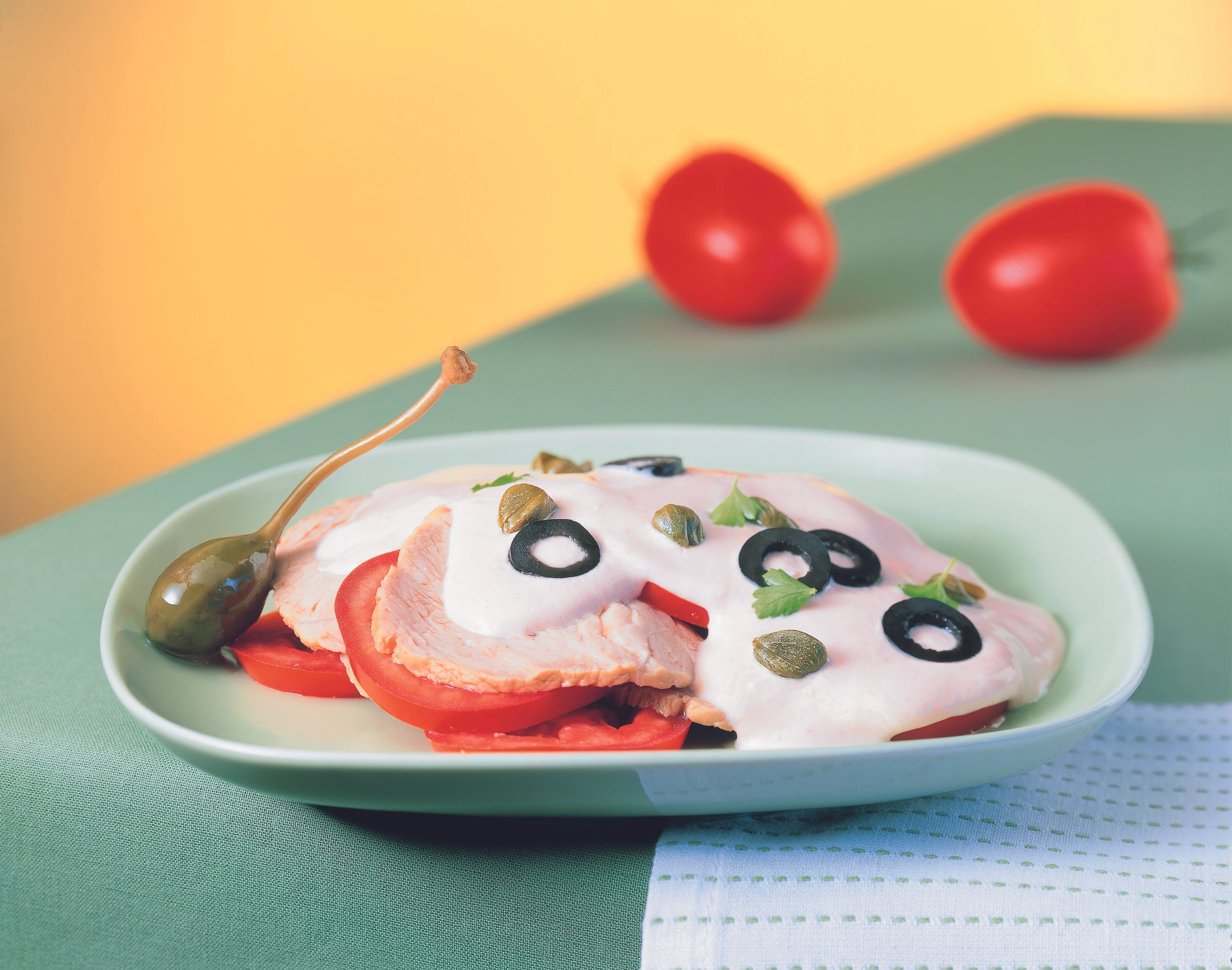 Vitello tomato: Kalb mit Paradeisersauce