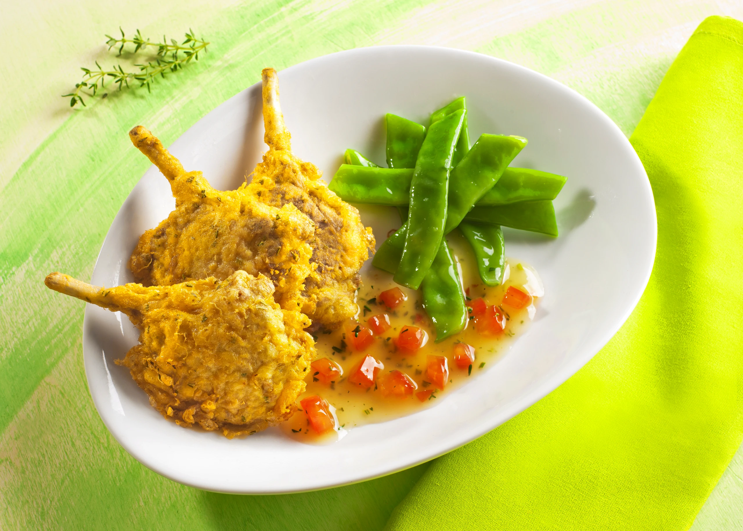 Lammkoteletts in Käsepanier