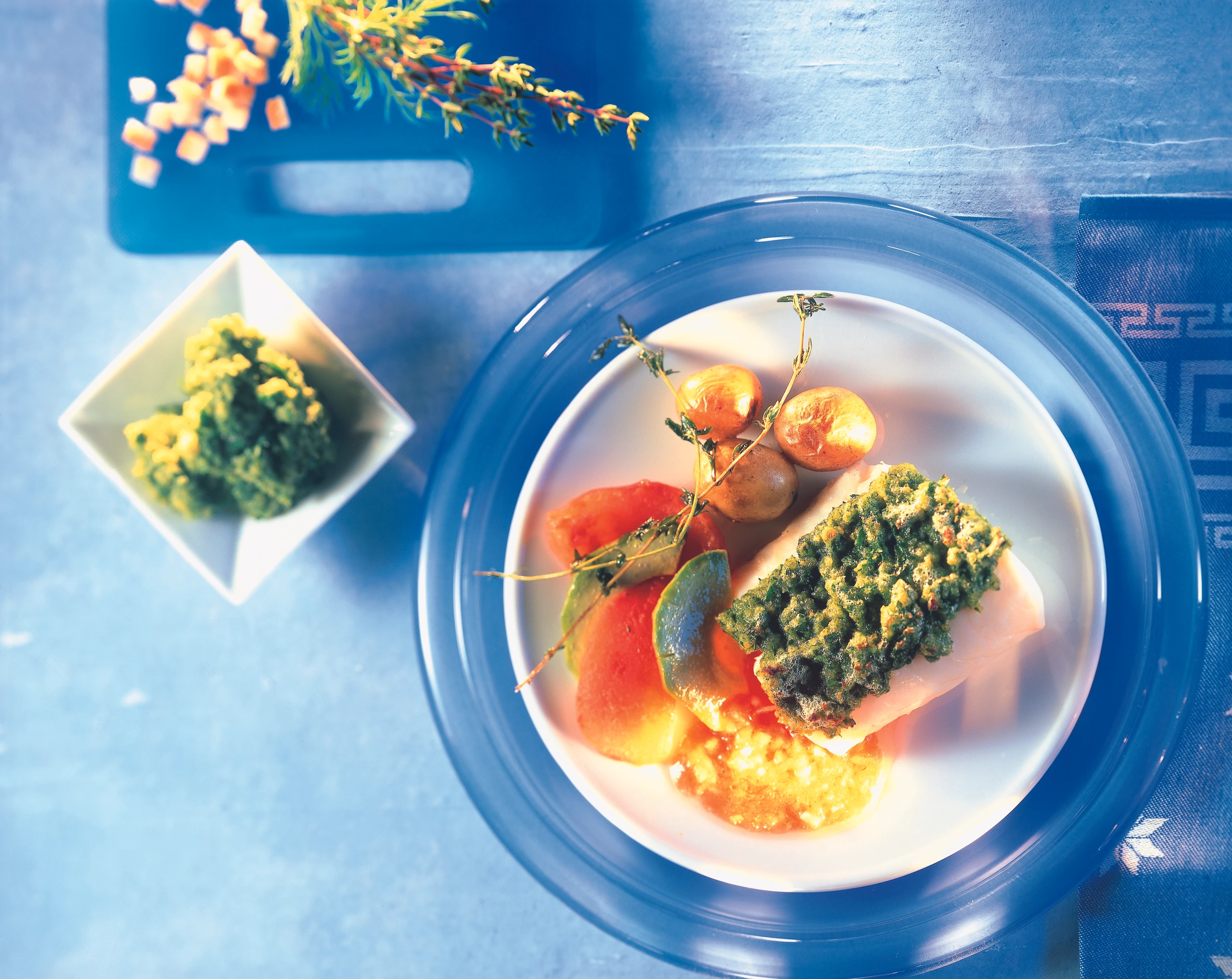 Kabeljaufilet mit Kräuterkruste und Paradeis-Vinaigrette