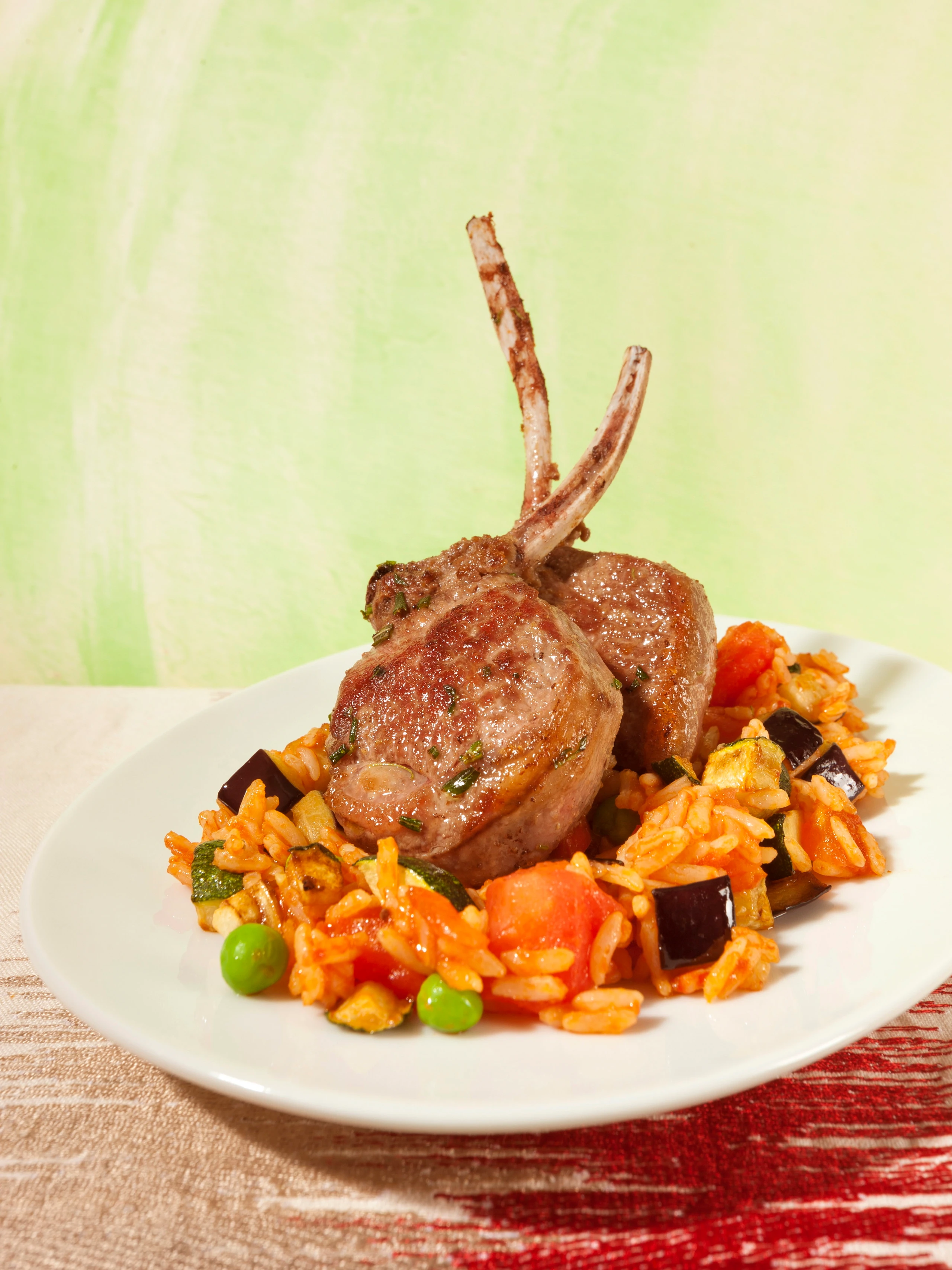 Lammkoteletts mit Paradeisreis