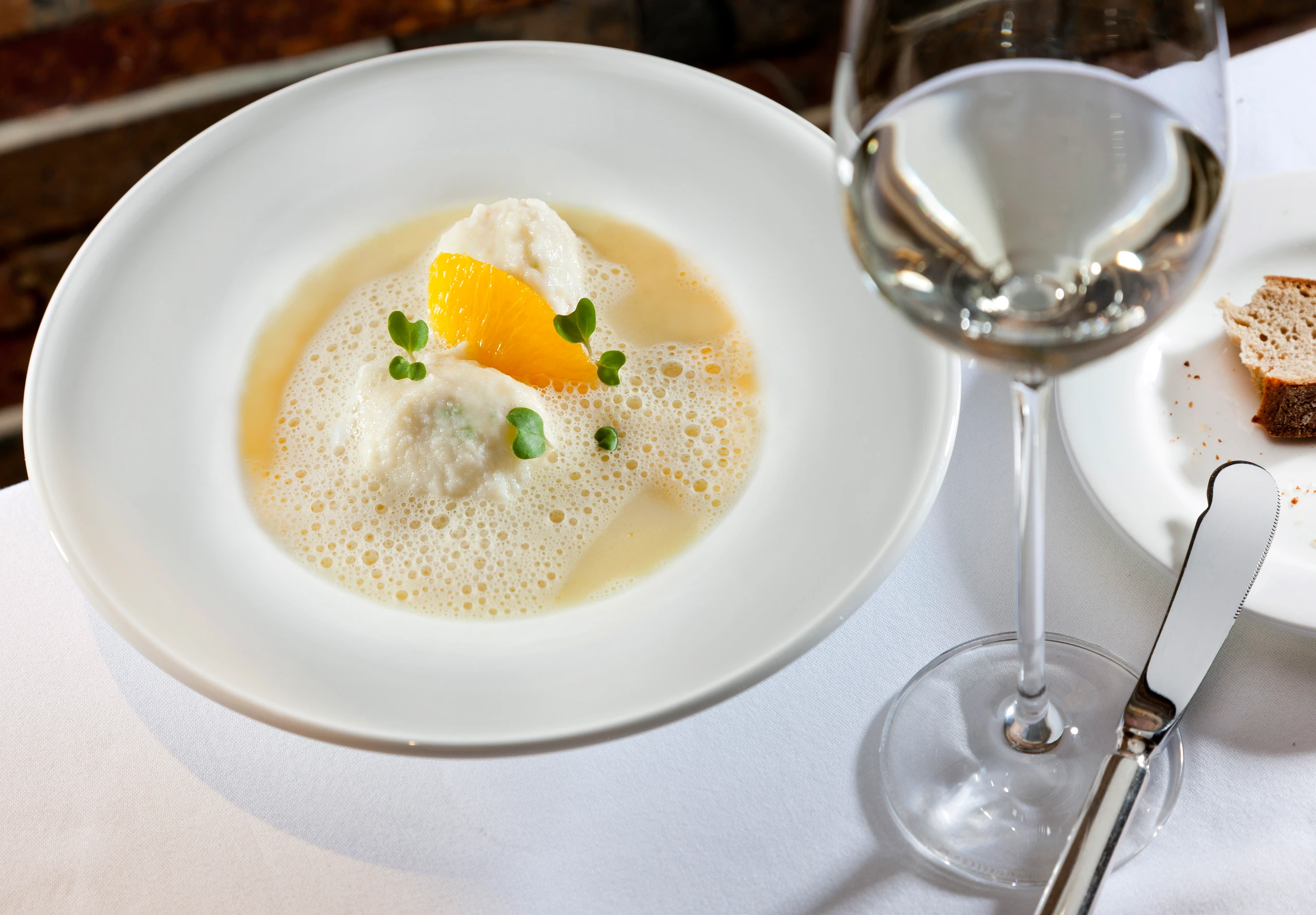 Orangensuppe mit Topfen-Käseknödeln