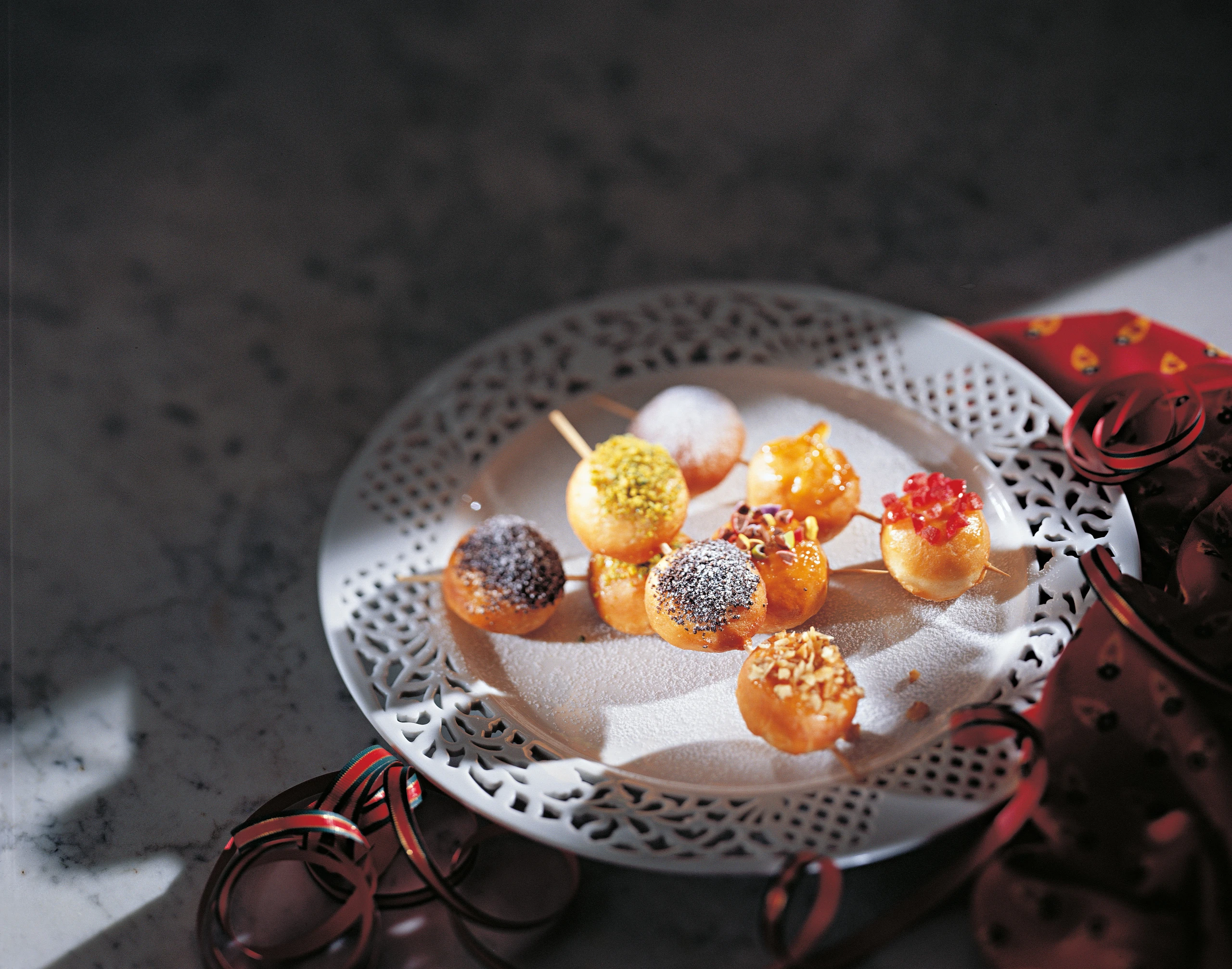 Orangenkugeln am Spieß gebacken