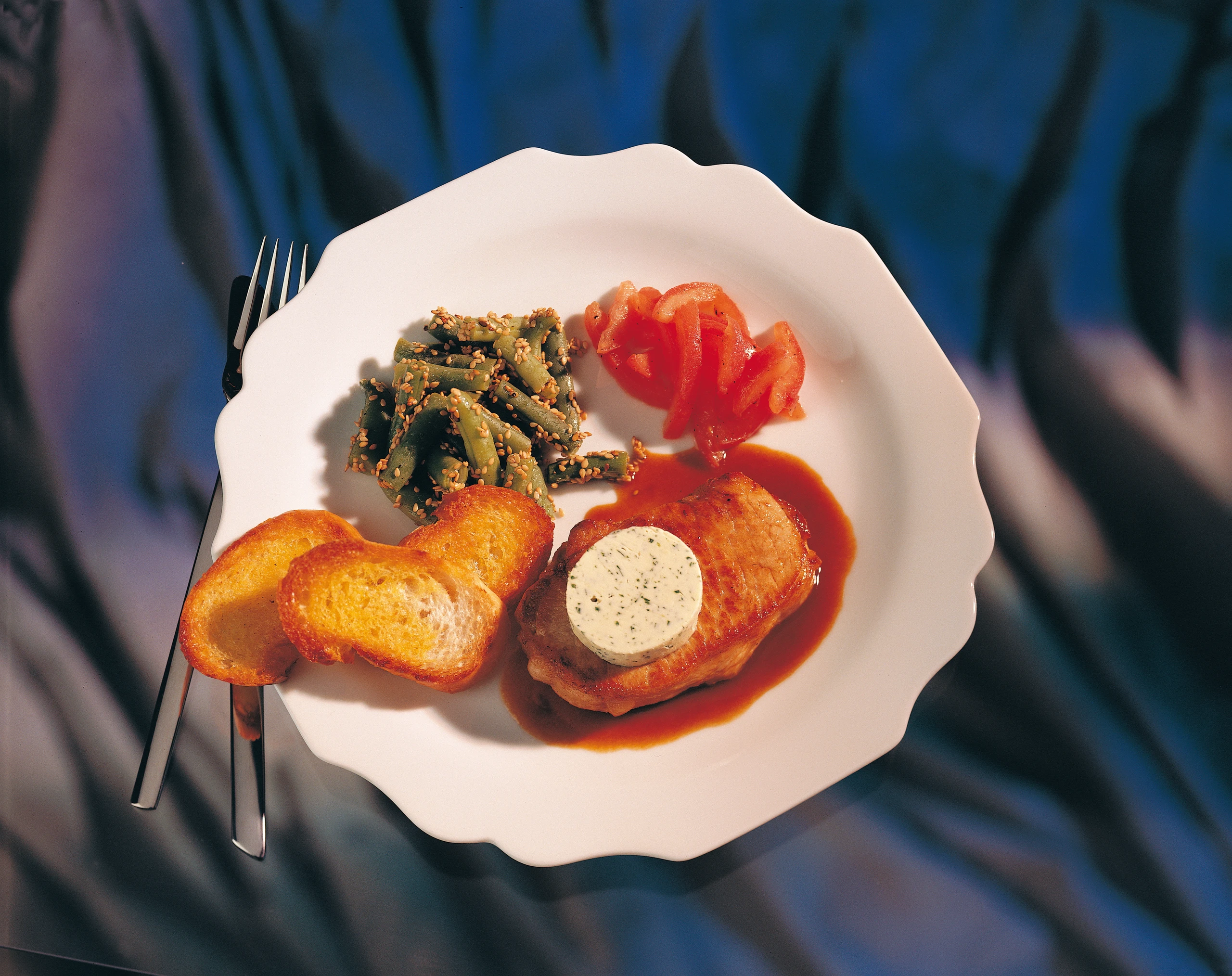 Schweinsrücken-Filets mit Petersil-Butter