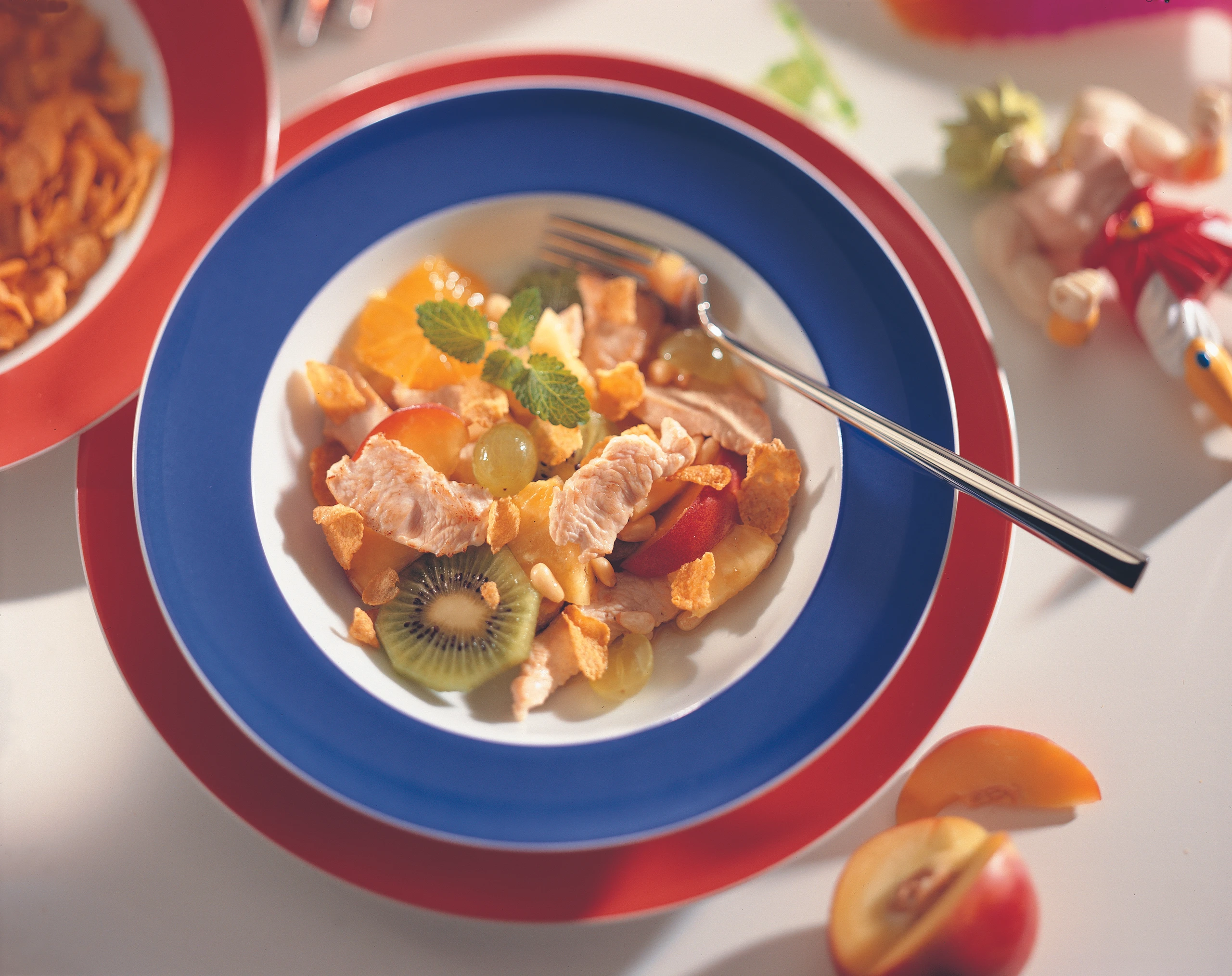 Pikanter Fruchtsalat mit Orangen-Marinade und Pute