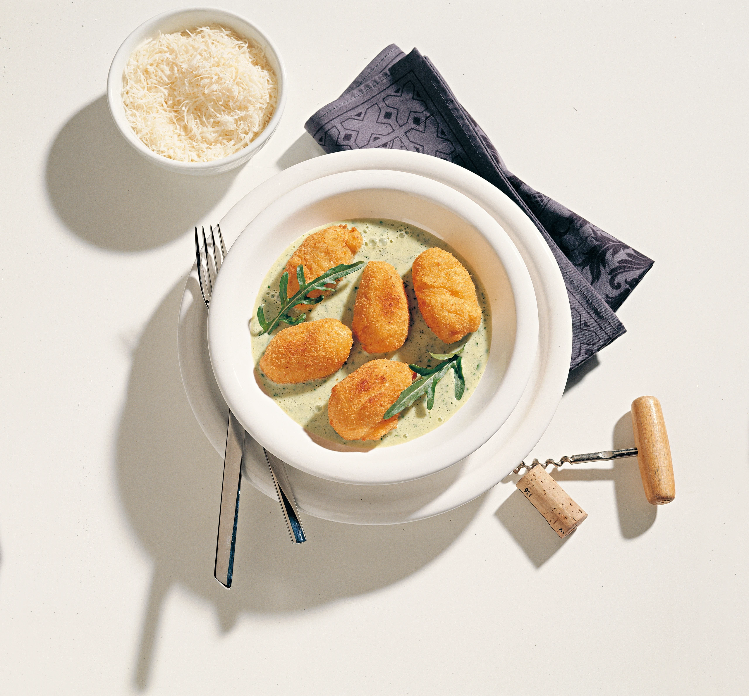 Gebackene Nockerl mit Rucola-Käse-Sauce
