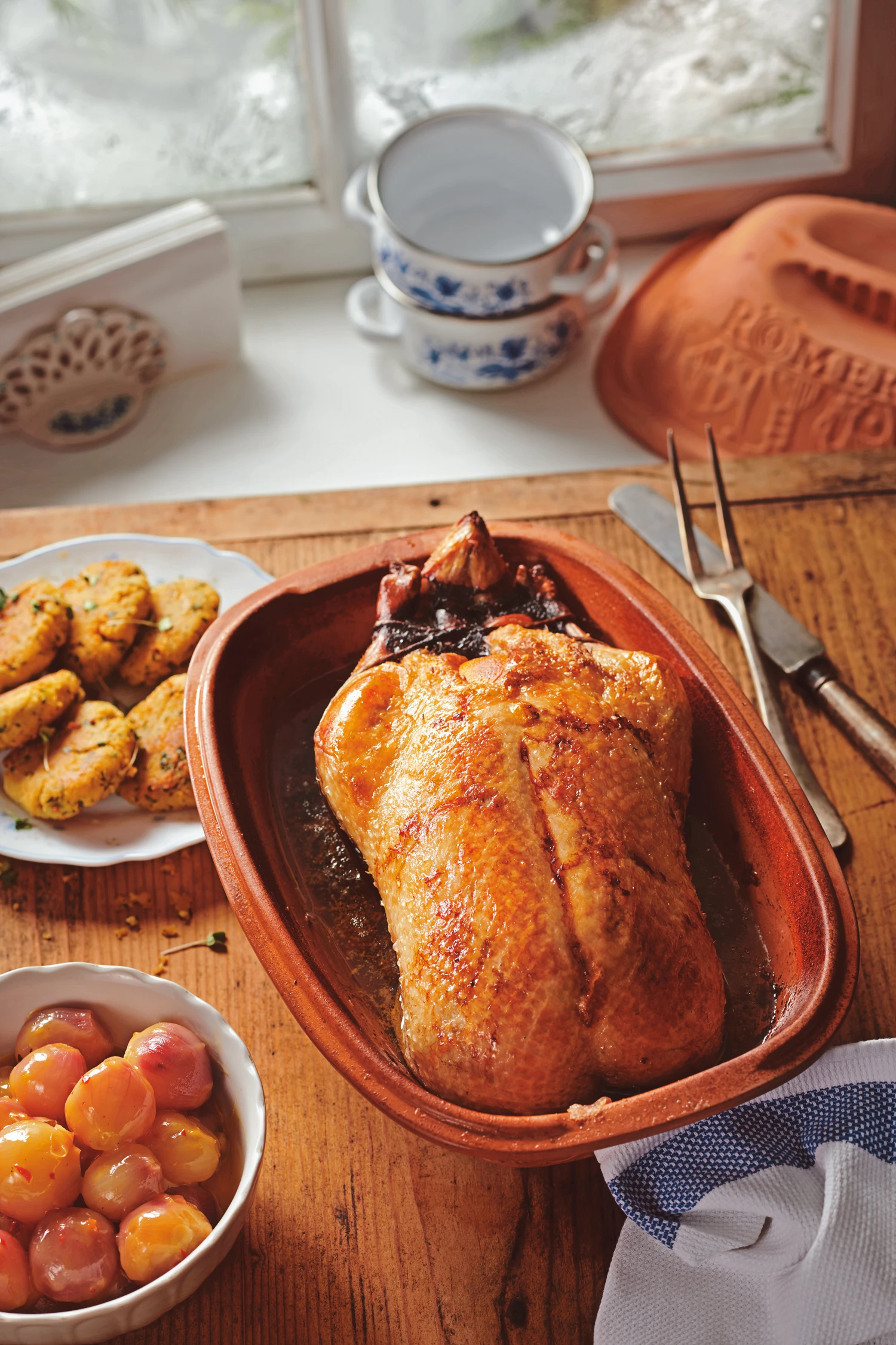 Ente mit Orangen-Chilischalotten und Erdäpfel-Couscouslaibchen