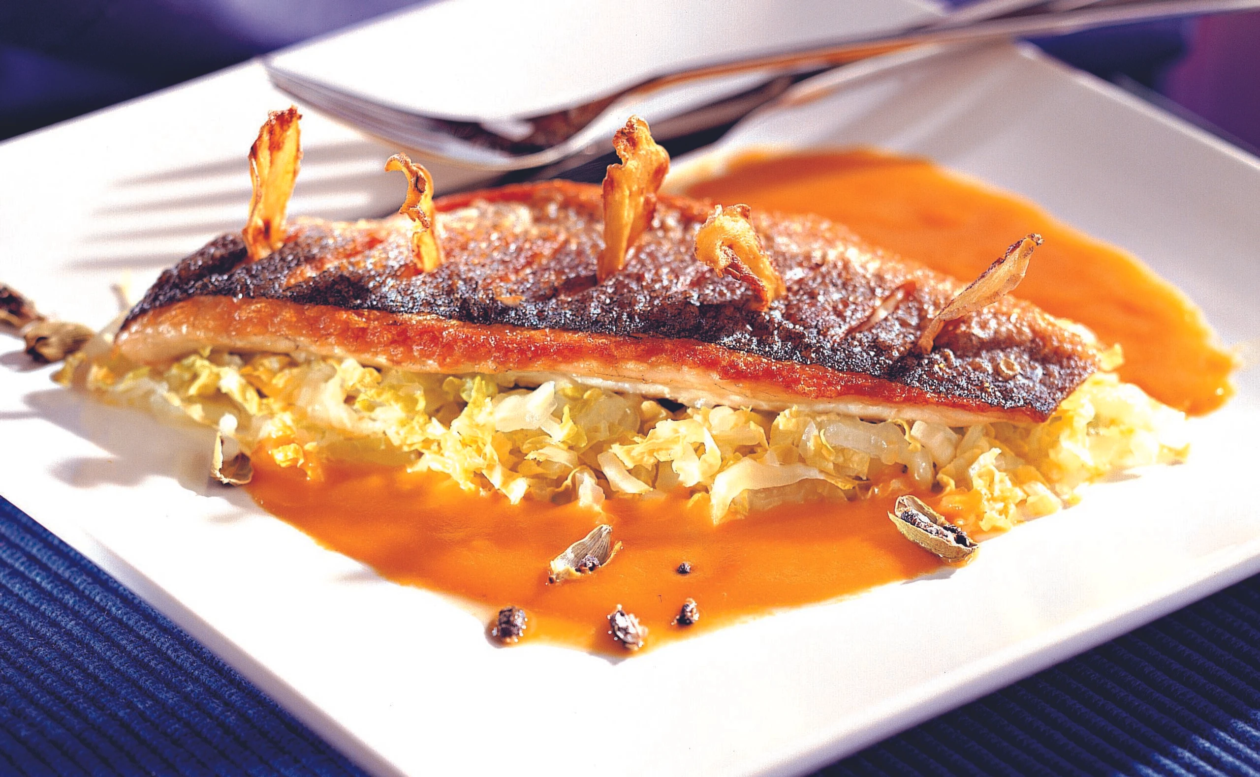 Wolfsbarsch mit Kürbis-Ingwersauce