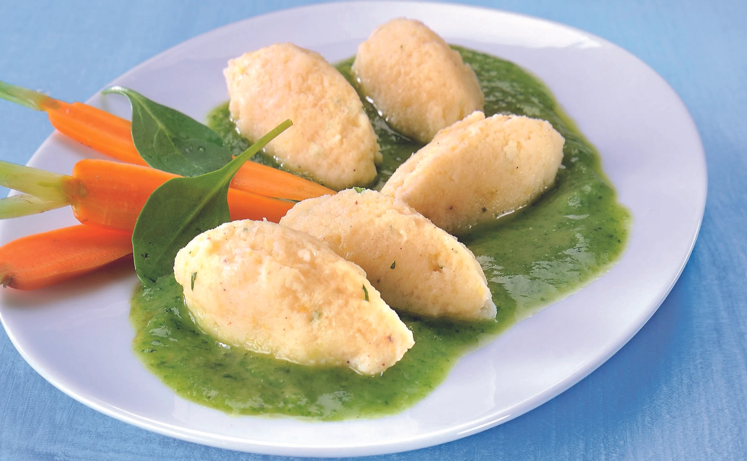 Fischnockerl mit Lauch-Spinat-Sauce