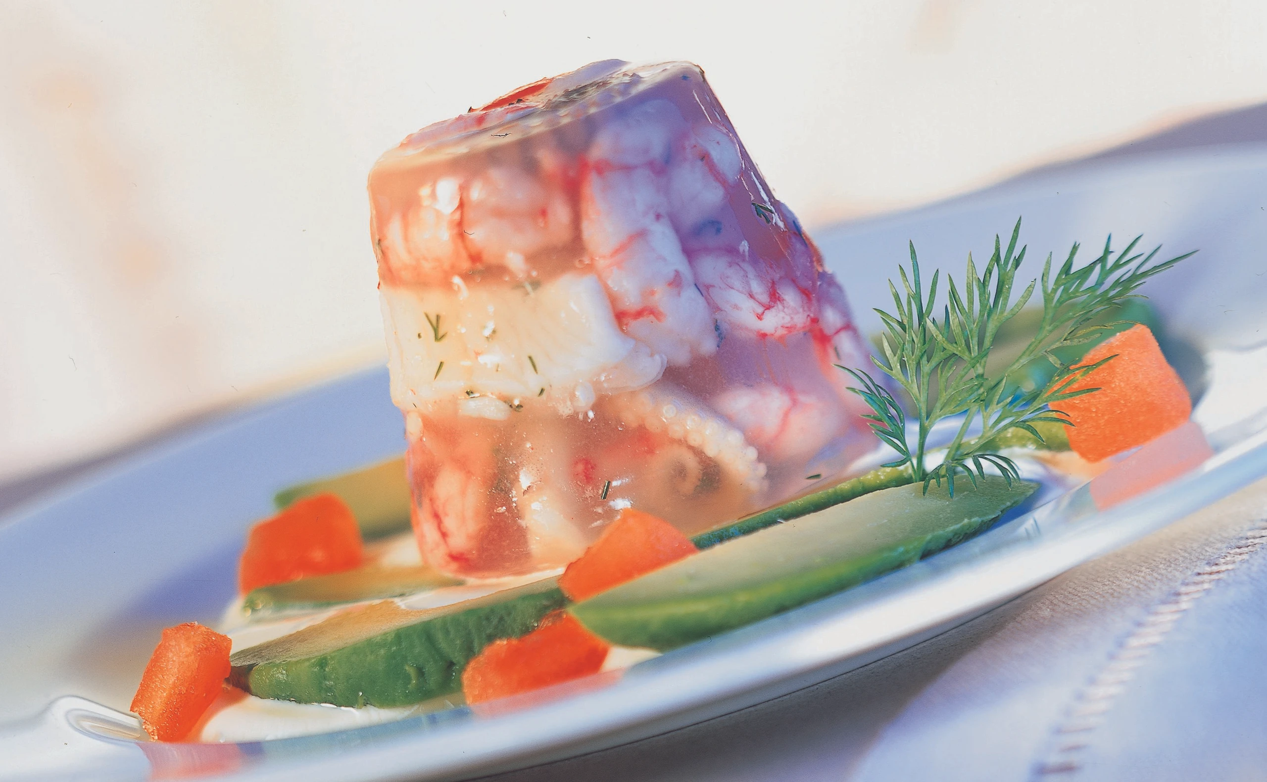 Fischsülzchen mit Meeresfrüchten und Zitronensauce