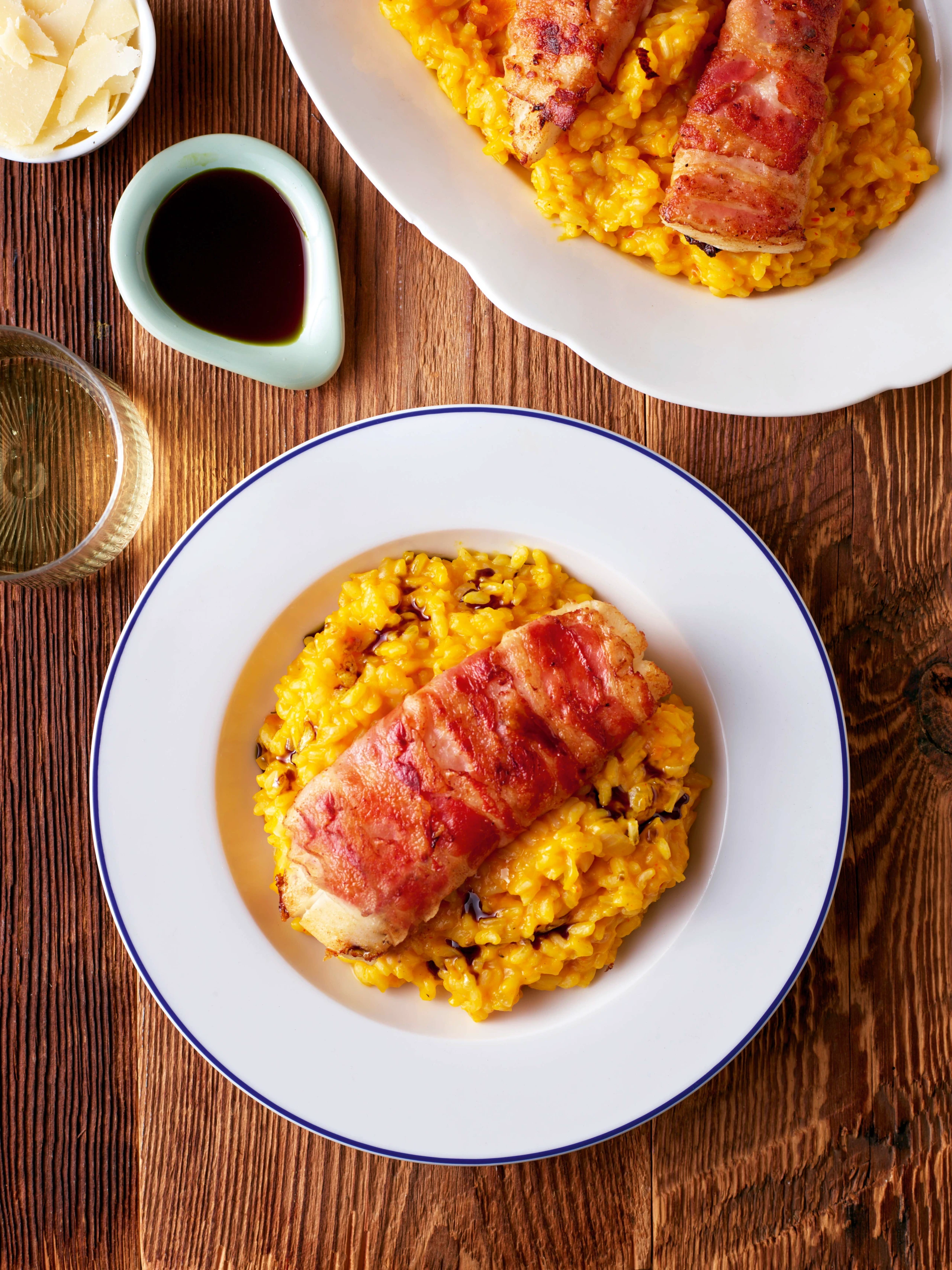 Kürbiskernölrisotto mit Zander im Speckmantel